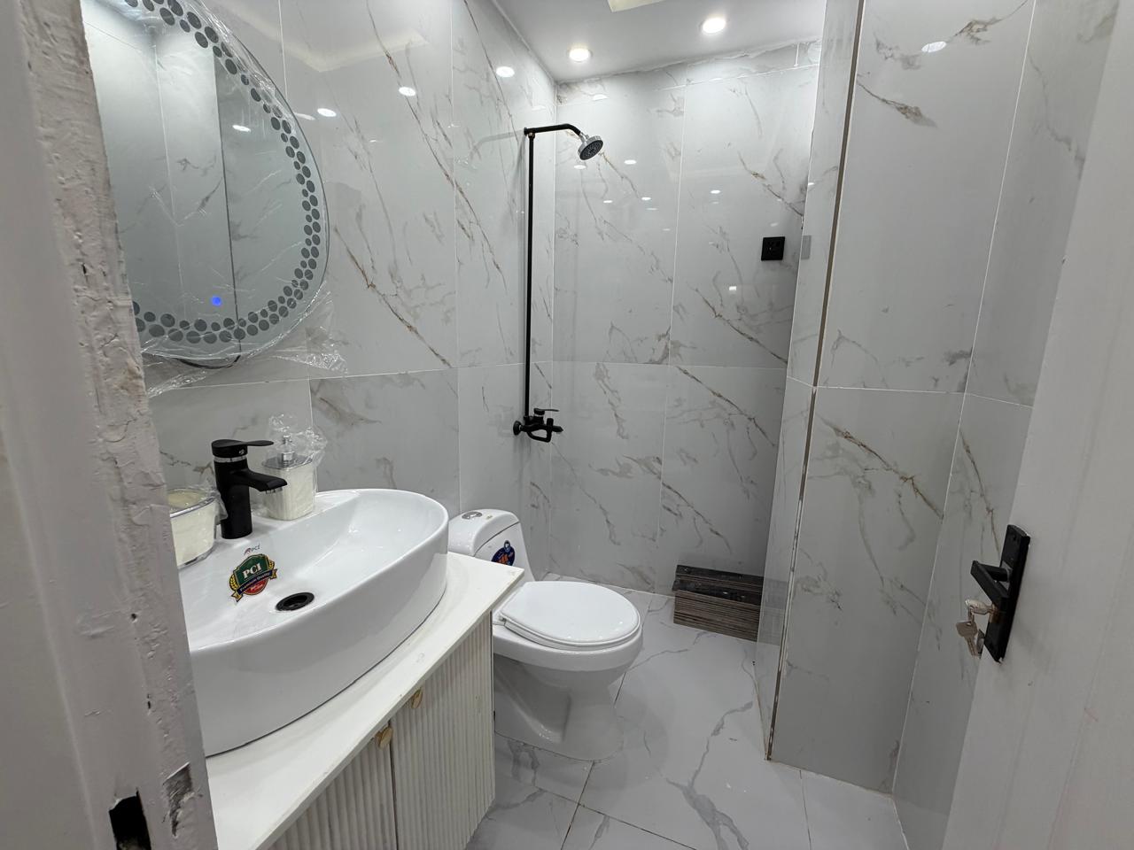 Bathroom of fully furnished apartment near Doctor Hospital Lahore